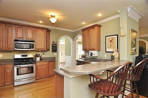 Kitchen opens to both the family room and dining room.