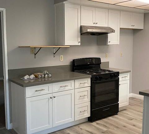 Brand new kitchen. Microwave shelf helps save counter-space.