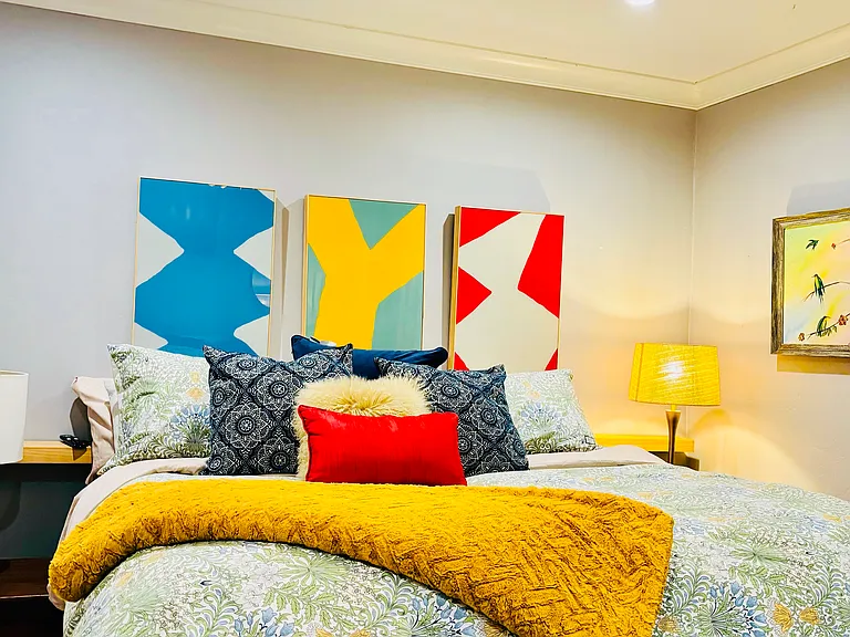 spacious and luxurious primary bedroom designed for ultimate comfort and style. At the heart of this sanctuary is a heavenly mattress, unlike any other, dressed in luxury sheets, down comforter, and plush down pillows_guaranteeing the best sleeps ever.