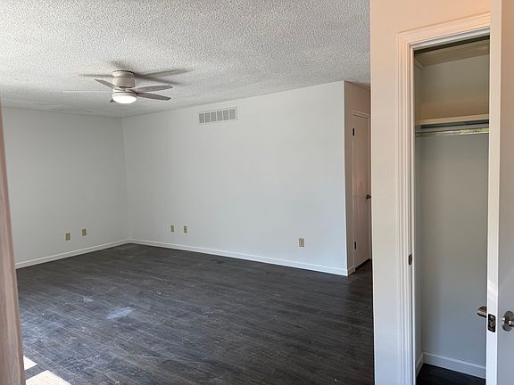 Living room from front door with entry closet