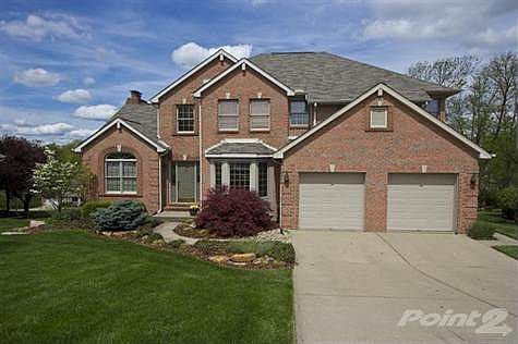 <marquee behavior="alternate">   <font color="#660000"><strong>TAKE THE VIRTUAL TOUR</strong></font>  </marquee>  This home is brimming with exquisite details! The front of this home offers a full brick exterior with quadruple gable and hip roofline, bay window, beautiful landscaping, decorative keystones above every window, ornate brick soldering and a two car garage. The yard has been meticulously maintained with the grass looking like it belongs on a golf course. Perennials, trees and shrubs all create a beautiful atmosphere you can call home.