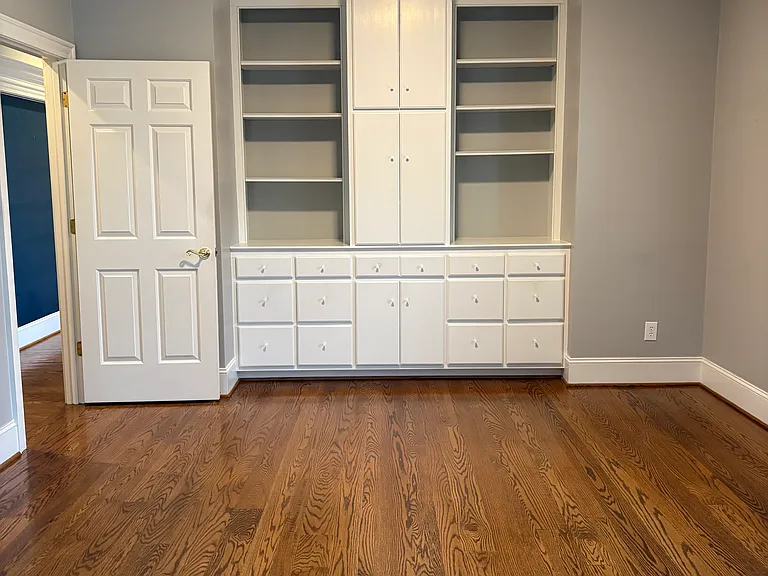 Main Level Primary Suite with custom cabinetry