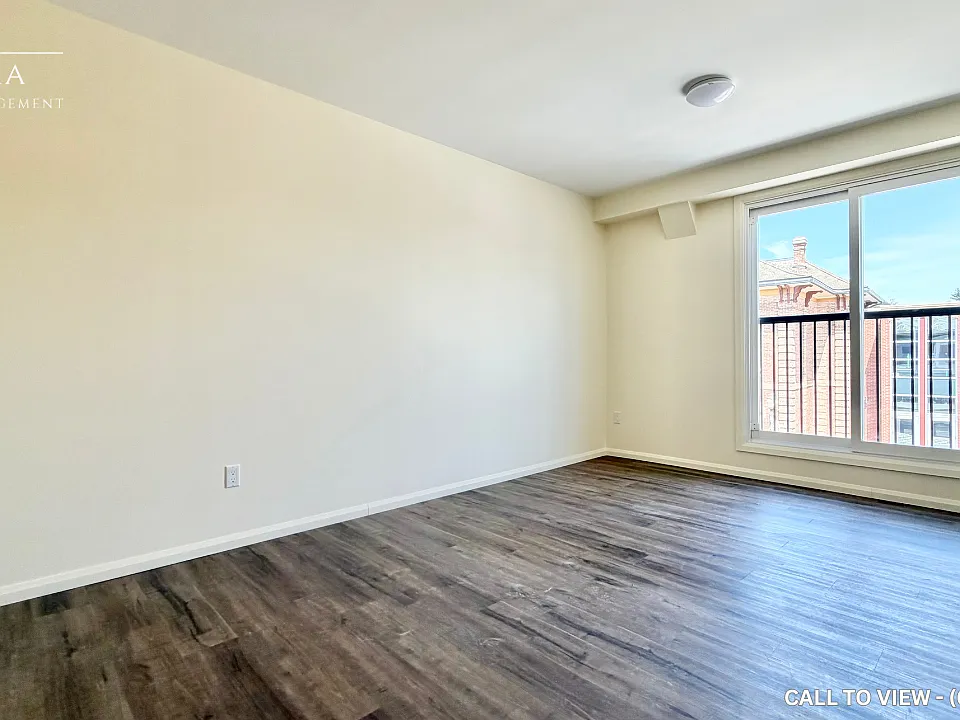 101 Main St W #203