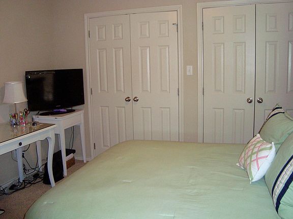 Typical bedroom with double closets