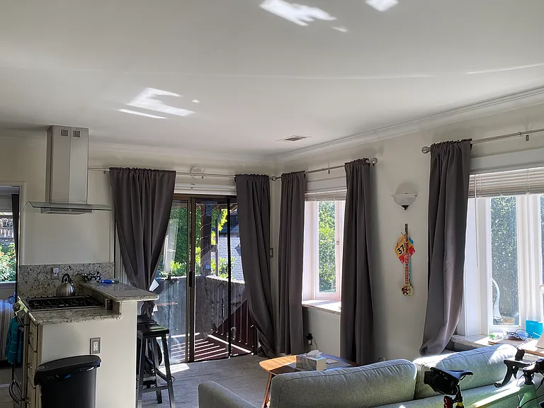 Main studio and open kitchen with Granite counter top and bar