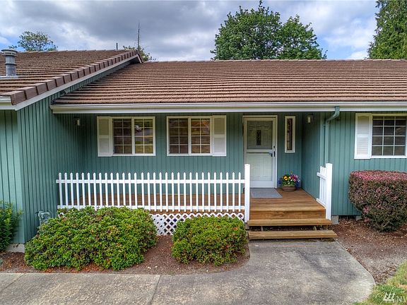 Welcome Home!  The outside covered entry has room for seasonal decorations or an outdoor sitting area.