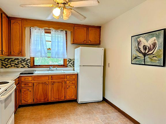 Great eat in kitchen with lots of cabinets .