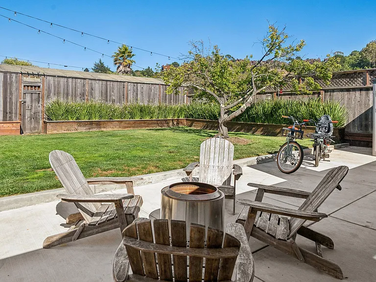 Large fenced backyard with plenty of room for kids and pets