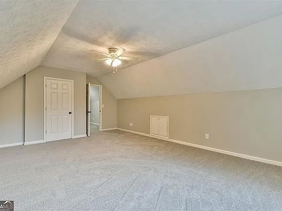 bonus room with full closet and window