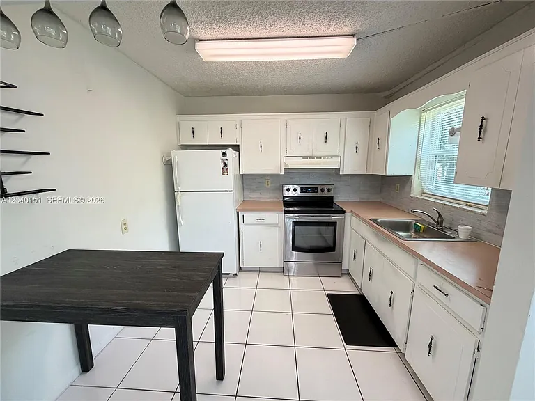 5771 SW 36th Ct #301 — Photo 14
