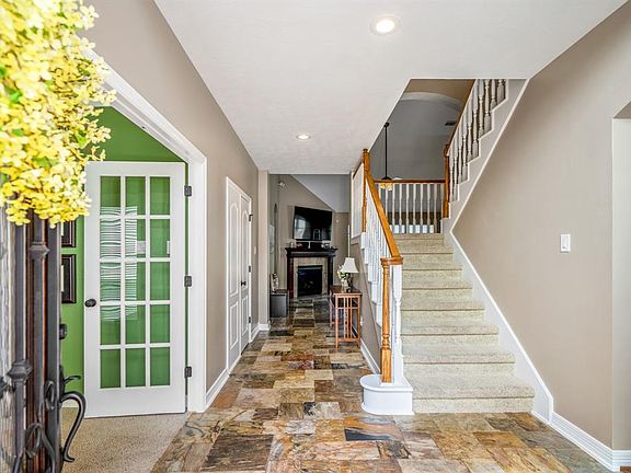 The large foyer area is the perfect place to welcome guests to your new home. To the left you will find French doors leading to the home office / study area.