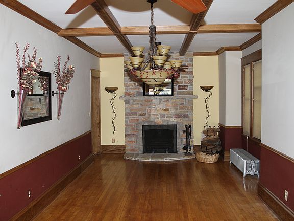 Stunning stone floor-to-ceiling fireplace