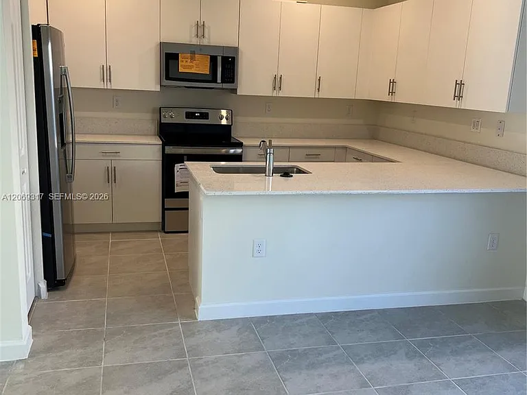 11447 W 34th Ct — Photo 16