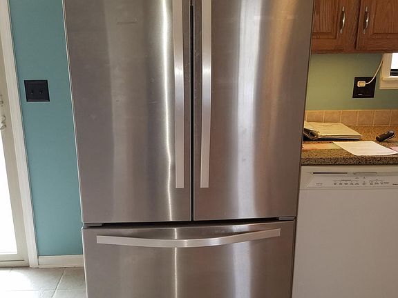 Stainless steel fridge included