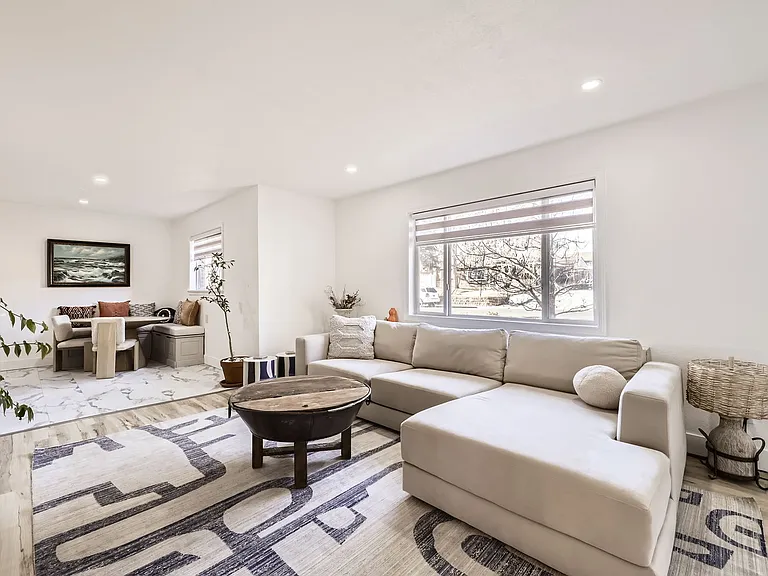 Cozy living room open to dining and kitchen