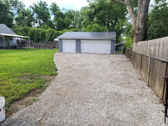 Three car garage with off street parking.