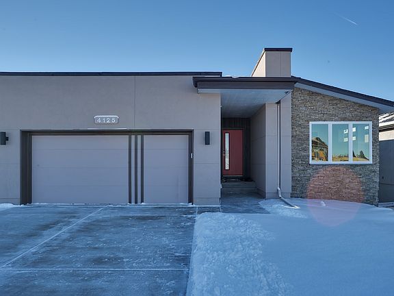 Baker Flat Roof Photo representing home to be built and may demonstrate optional features