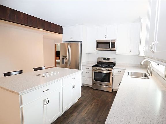 4th image of 6918 Maple Ave N