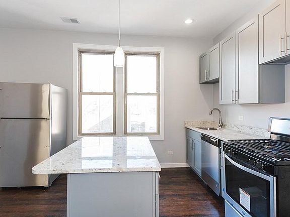 Granite Island and countertops, 1 year old appliances