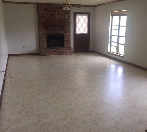 View inside back door of great room and fireplace