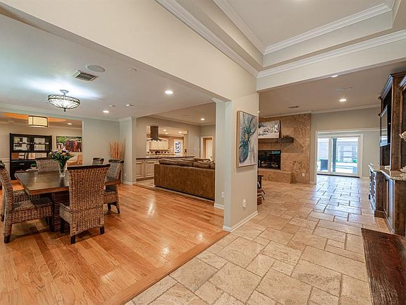 The current owners opened walls to create an open and flowing floorplan perfect for today's active households.