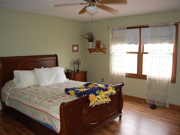 Master bedroom with laminate flooring