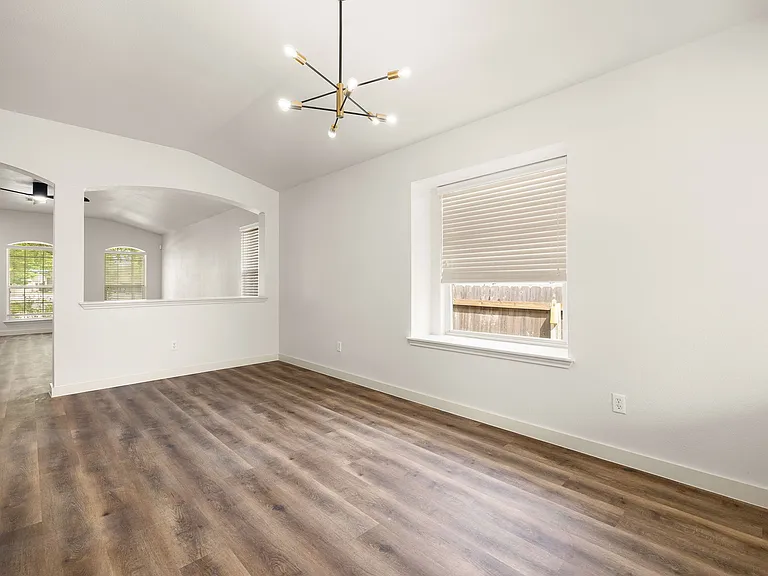Large dining area off of the kitchen were you can have fun family dinners or host friends