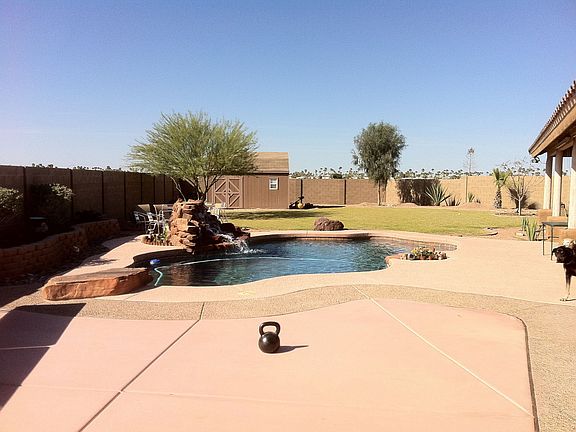 back yard pool waterfall shed