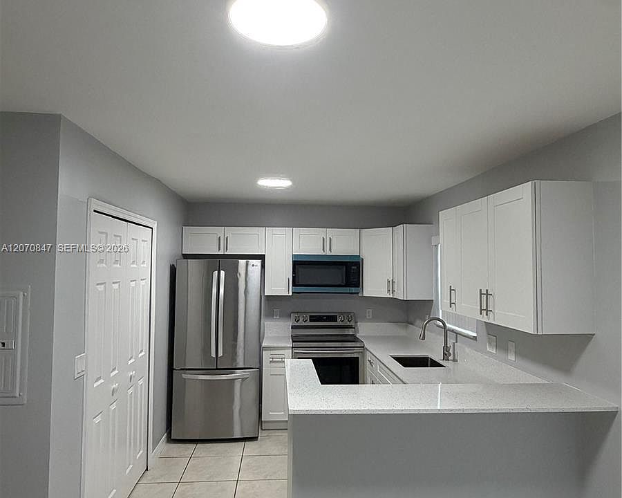 1st image of 1261 SE 27th St Unit 101