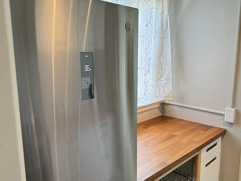 New refrigerator and prep area.