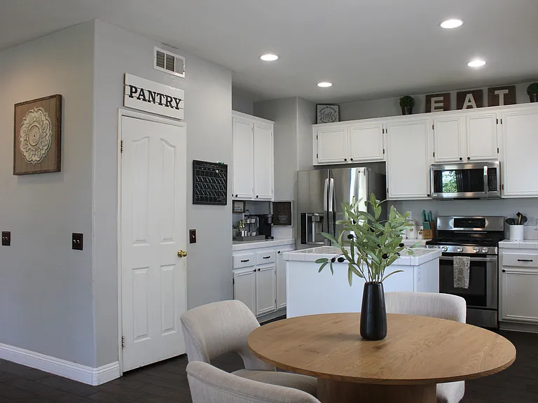 Ample cabinet space and walk-in pantry