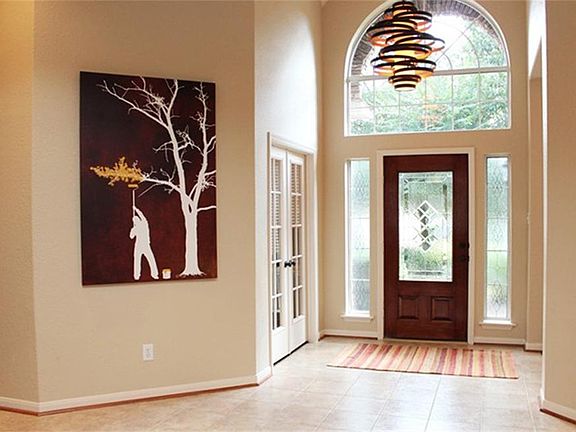 Inside tiled front foyer. NO Carpet in house! and inside completely painted in 2011.