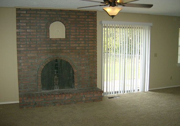 Living Room with Wood Burning Fireplace