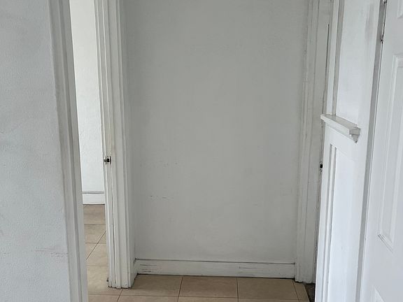 Hallway between bedroom and bathroom