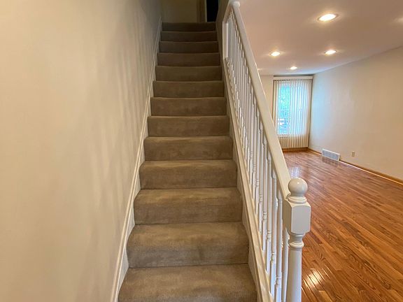 Main level : Open Living and Dining rooms with hardwood floors