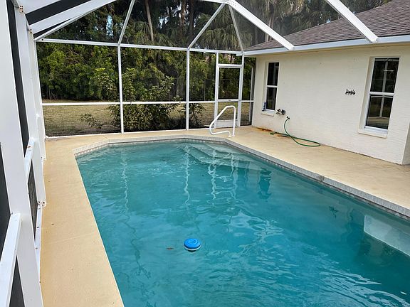 Covered, solar-heated pool