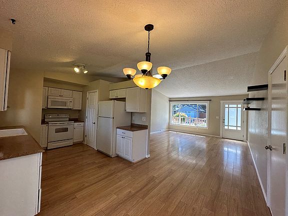 Practical kitchen with cabinet space, appliances and pantry