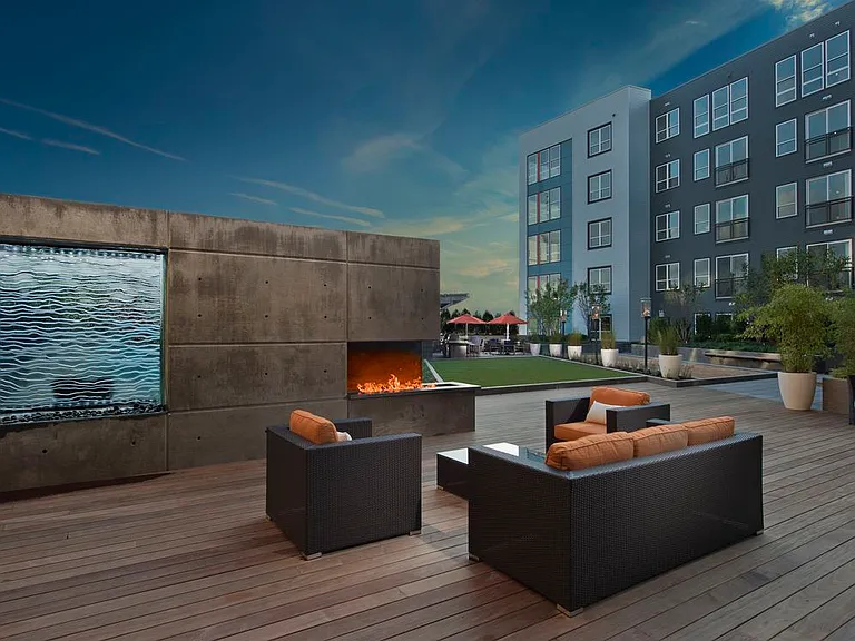 Courtyard with outdoor fireplace and lounge seating