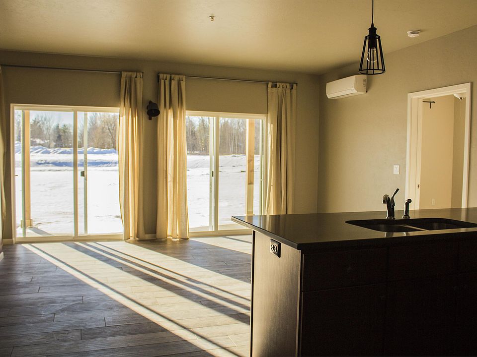 Main Area w/ Patio Doors and Outdoor View