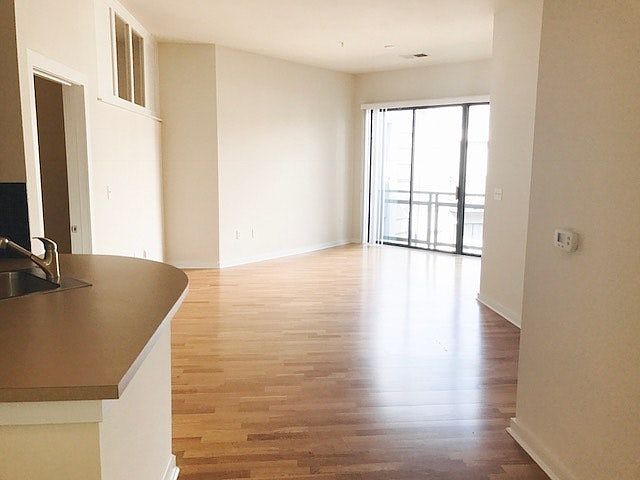 View of apartment as you walk in! REAL hardwood floors!