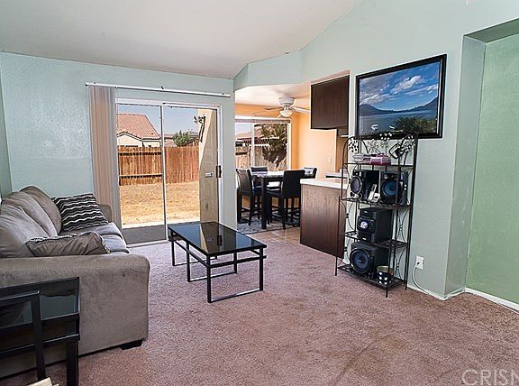 family room leads to back yard