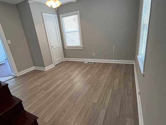 formal dining room/ office with a closet