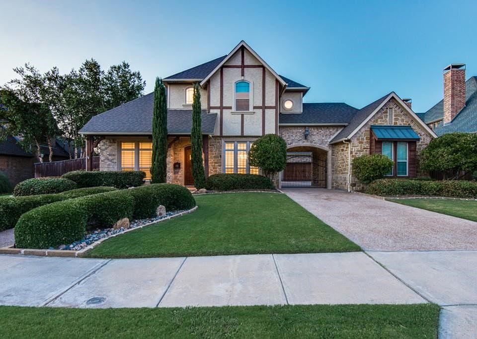 Stunning Drive up with Stone and Brick