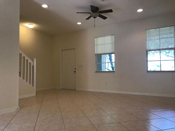 5th image of 141 E Thatch Palm Cir