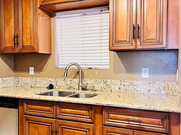 Kitchen (cabinets and dishwasher pictured)