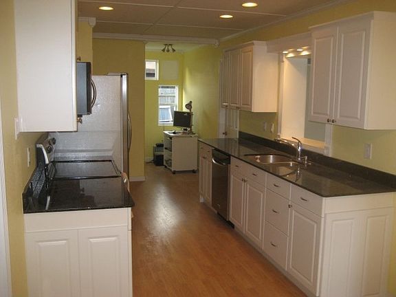Kitchen looking towards laundry room and pantry