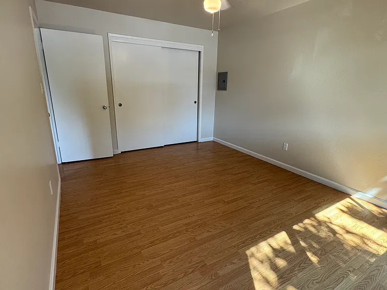 Larger bedroom (of 2BR), alternate view