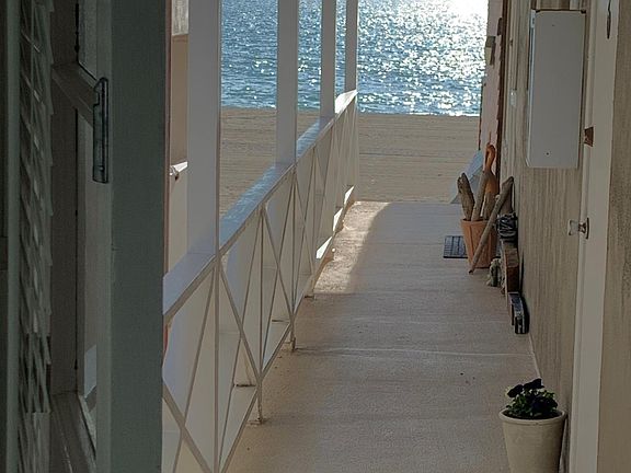 View from living room area. Private entrance with seating area.