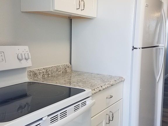 Kitchen also has new stove and refrigerator and beautiful vinyl plank flooring.