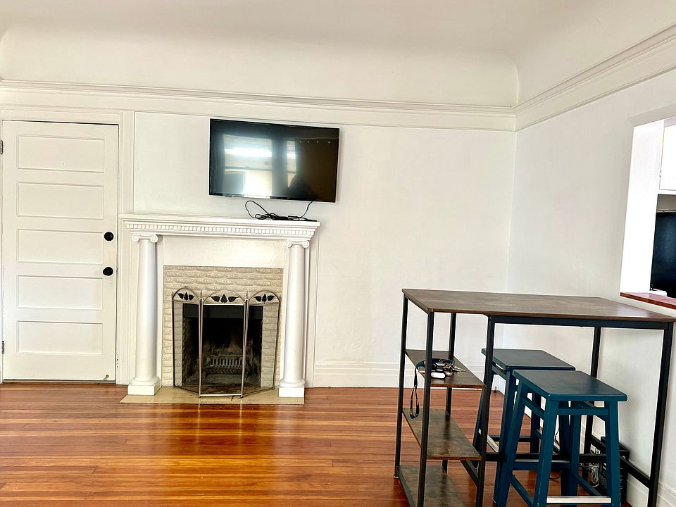 Living Room with working fireplace and Smart TV